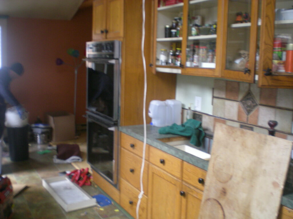 disarranged kitchen and dirty messy kitchen cabinets